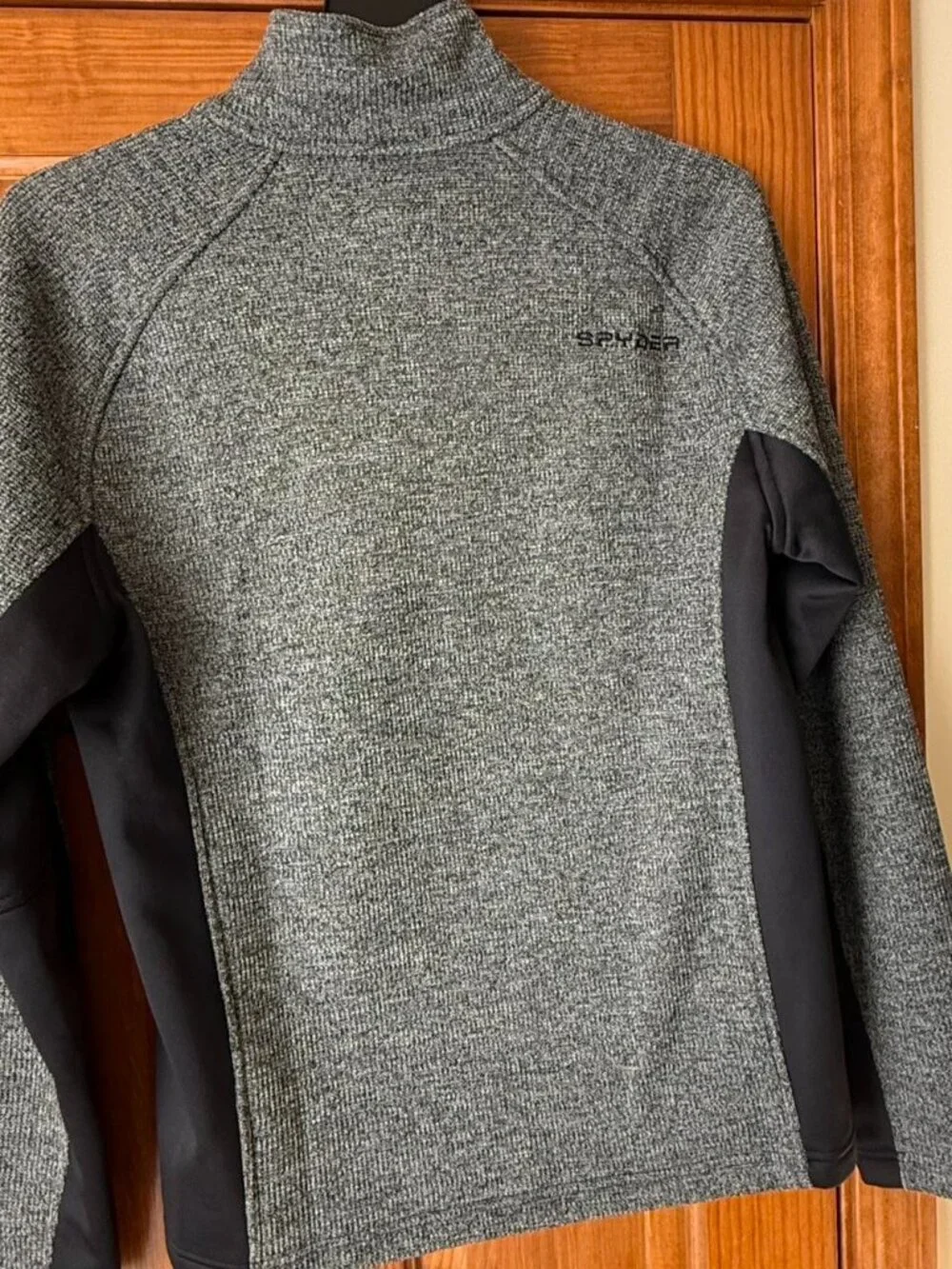 Grey and black Spyder quarter zip sweater